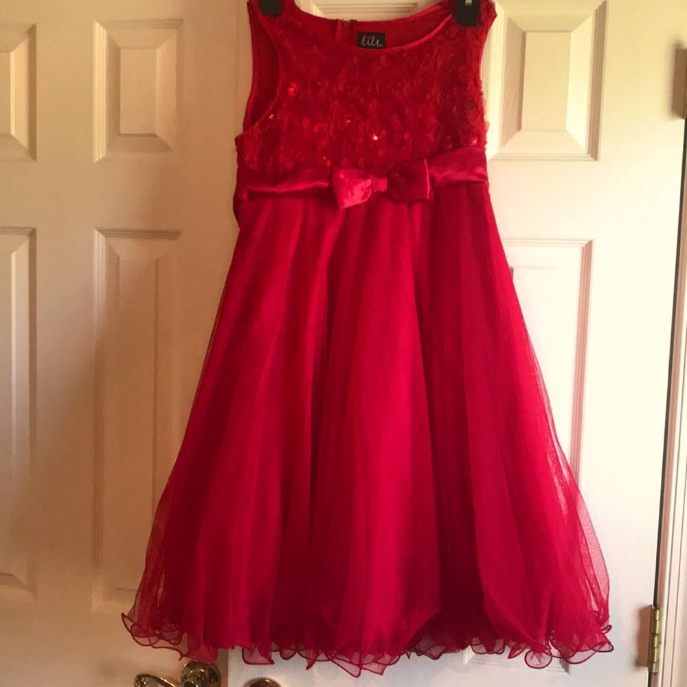 Beautiful red dress with glitter and bow